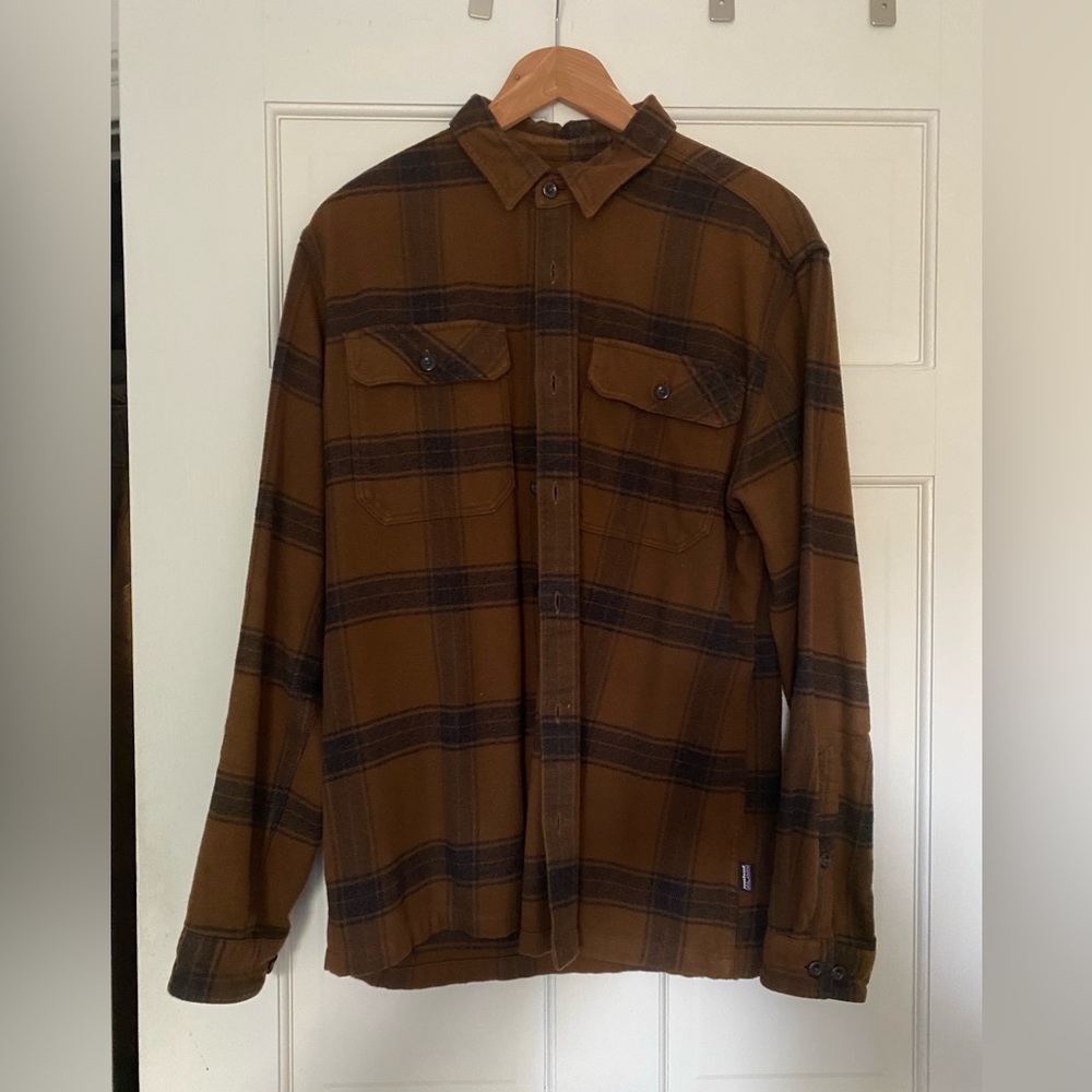 Lightly worn Patagonia flannel. Brown/black plaid. Super warm and soft.